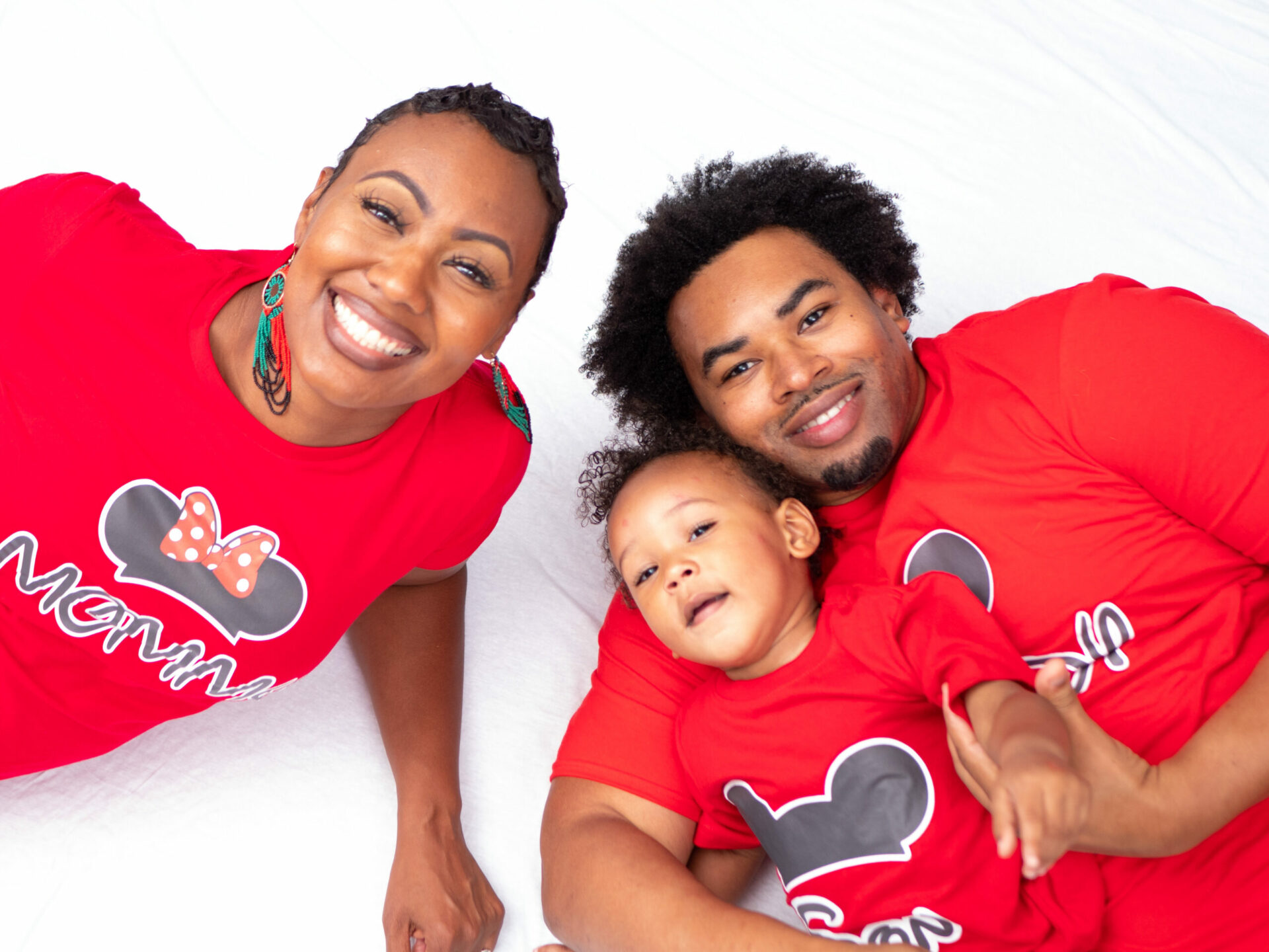 Family portrait with father, mother and toddler son.