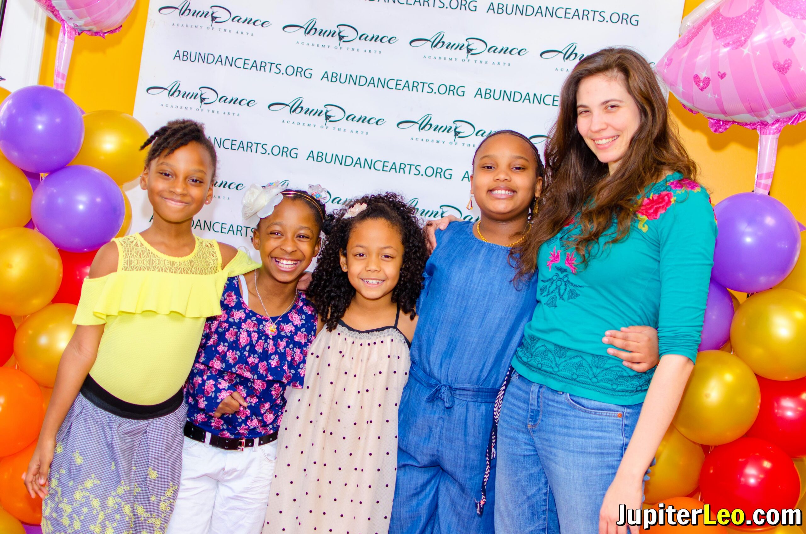 Group photo of dance instructor with her students.